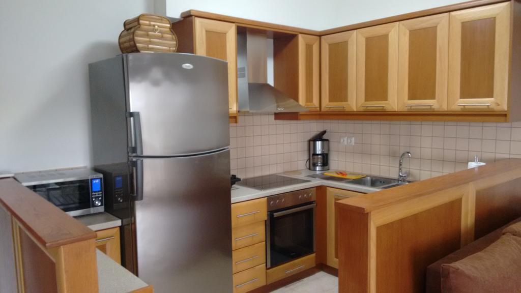 Tholos Bay Suites Kavoúsion Habitación foto